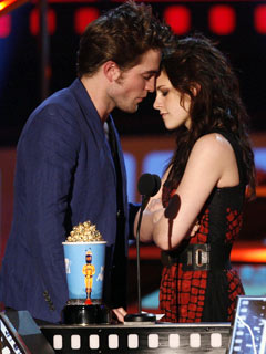 Patterson and Stewart feign a passionate moment